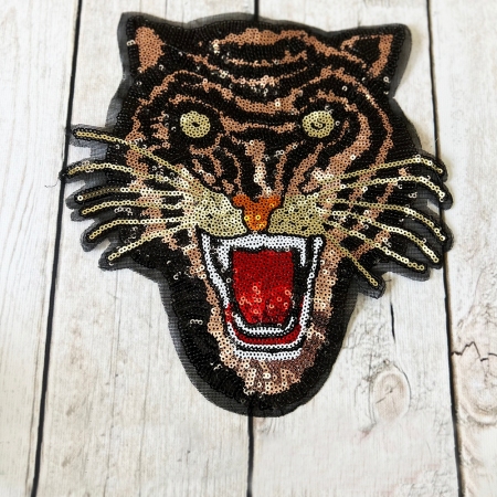 APLIKACJA TYGRYS W CEKINACH